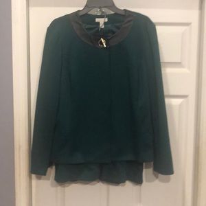 Green suit with black faux trim